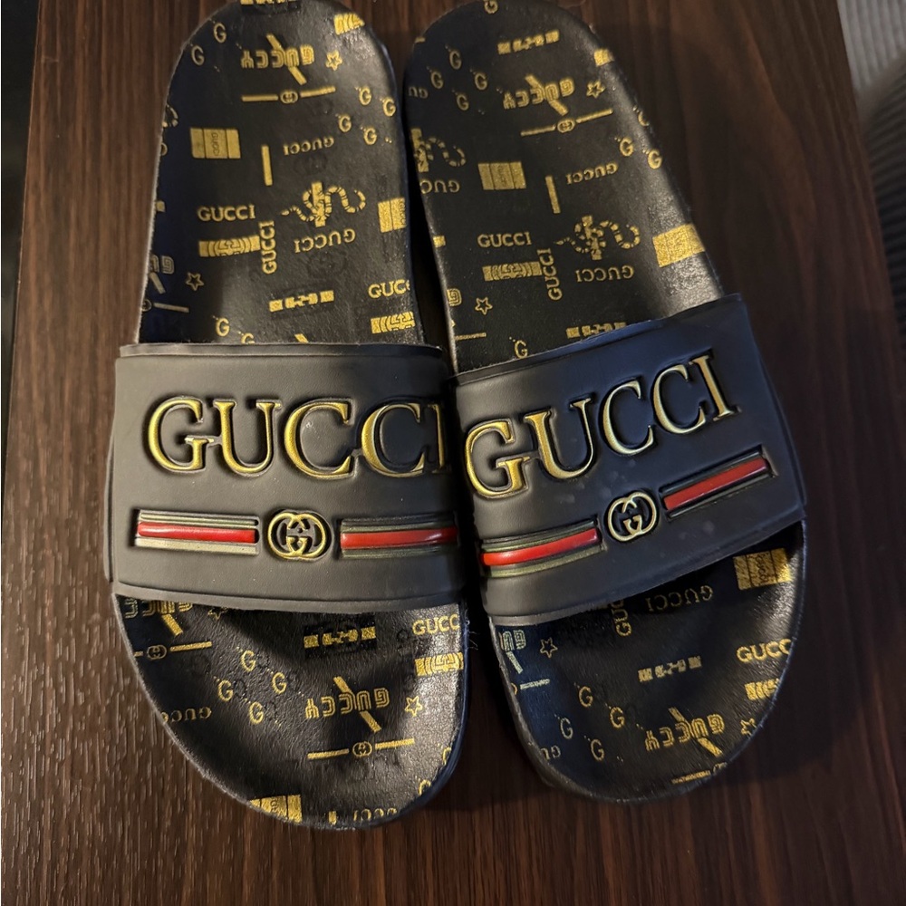 Gucci Black Slides with Gold Logo and Red Stripe